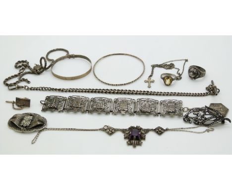 A collection of silver jewellery to include fob chain, silver ring, silver brooch, silver and marcasite necklace, filigree it