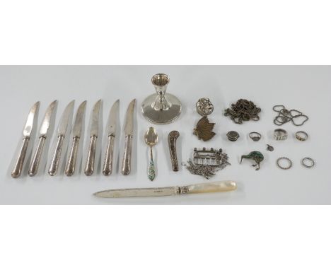 Hallmarked silver dwarf candlestick, hallmarked handled knives, possibly Georgian hallmarked silver belt buckle, figural butt