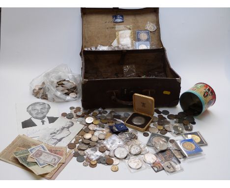 An amateur collection of UK and overseas coinage in a vintage suitcase
