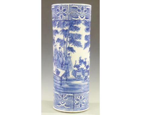 A 19th/20thC Chinese blue and white porcelain stick/umbrella stand decorated with figures amongst bamboo, height 60cm