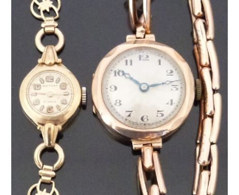 Two 9ct gold ladies wristwatches one Edwardian with blued hands, black Arabic numerals and sunburst dial, on 9ct gold expandi