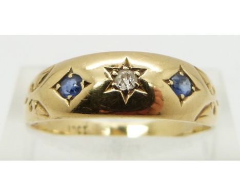 An 18ct gold ring set with a diamond and two sapphires, Birmingham 1896, size R&nbsp;