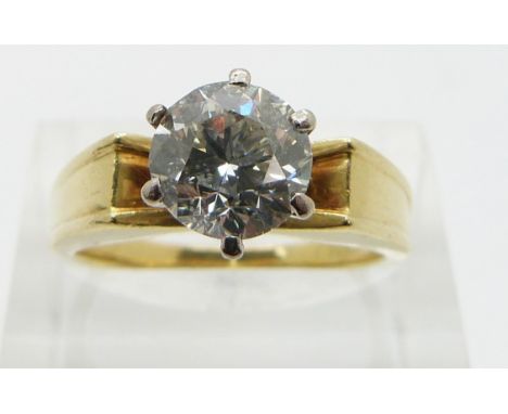 An 18ct gold ring set with a diamond of approximately 1.66ct, the diamond purchased in South Africa, size O