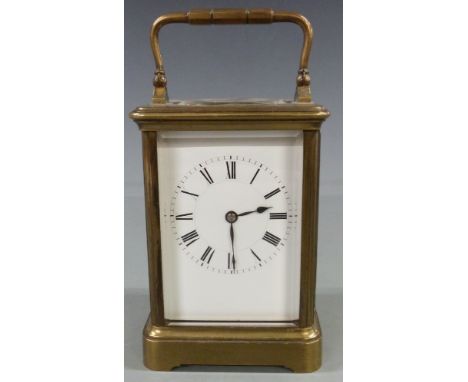 Early twentieth century French brass carriage clock in corniche style case, with white enamel dial and blued spade hands, 13c
