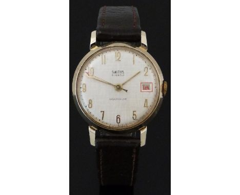 Smiths gold plated gentleman’s wristwatch with date aperture, gold hands and Arabic numerals, red arrow centre seconds hand, 