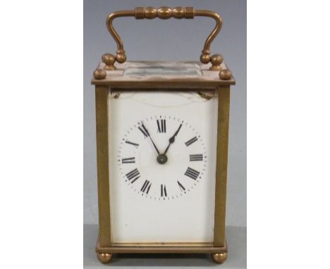 Late 19th/early 20thC French brass carriage clock, the white enamel Roman dial with spade hands, raised on ball feet, 10cm ta