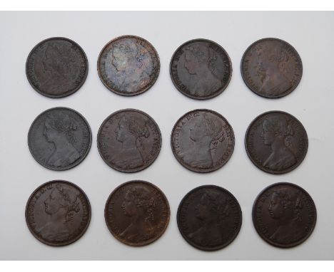 A collection of twelve 1870s young head bronze pennies to include 1870, 1872, 1873, 1874, 1875, 1878 and 1879, some Heaton Mi