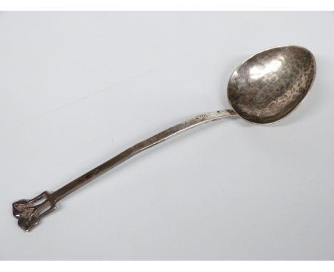A.E.Jones Art and Crafts hallmarked silver spoon with Art Nouveau style finial and hammered finish, Birmingham 1911, length 1