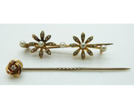 Edwardian brooch set with seed pearls in a floral design and a 15ct gold stick pin set with a diamond, 4g