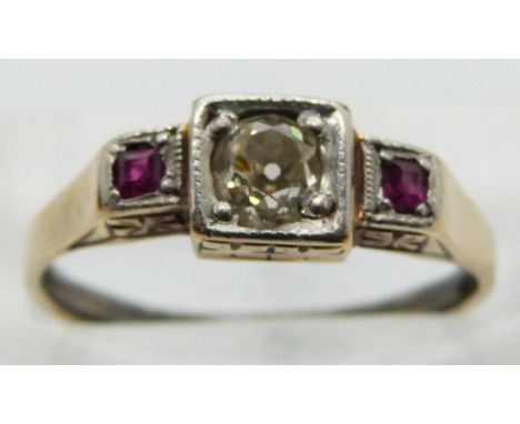 Art Deco ring set with an old cut diamond of approximately 0.3ct and two rubies, size K
