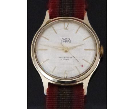 Smiths Empire gentleman's wristwatch with gold baton markers, red arrow tipped seconds hand, linen face, gold plated case and