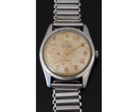 Cyma Cymaflex Navy Star gentleman's wristwatch with gold hands and Arabic numerals, champagne face, stainless steel case and 