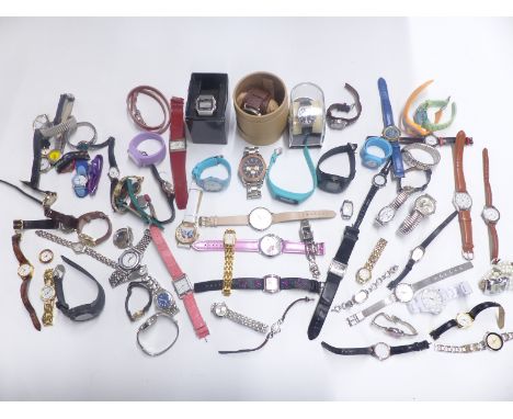 Over 70 various ladies and gentleman's wristwatches including Timex, Casio, Fossil etc, some in original boxes