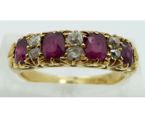 Edwardian 18ct gold ring set with old cut diamonds and oval cut rubies, size K