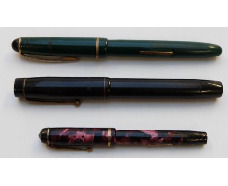 Three vintage fountain pens comprising Conway Stewart Dinkie No. 510 with marbled barrel and cap gold plated fittings and 9ct