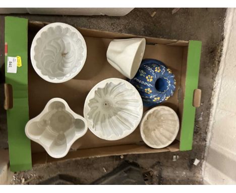 Box of various ceramic jelly moulds