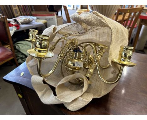 A five branch brass chandelier