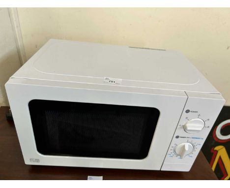 A white compact microwave