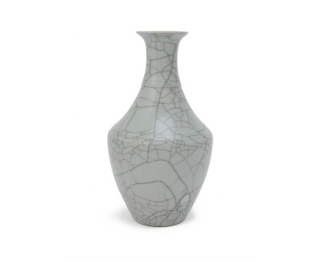 A Chinese ge-type vase, Qing Dynasty, applied overall with an unctuous grey-green glaze irregularly suffused with black and r