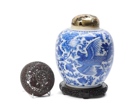 A fine Chinese blue and white ginger jar, Kangxi, the bright blue body painted with two Phoenix between scrolling foliage and