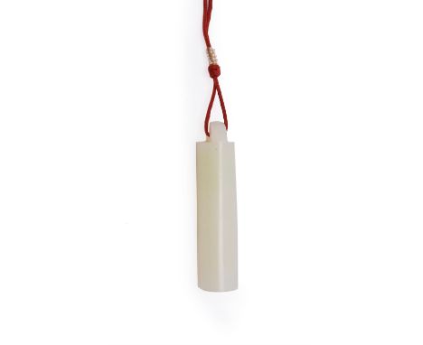 A Chinese white jade and russet plume holder, hollowed at the centre, 7.8cm long带皮白玉翎管Condition Report: GoodCondition Report 