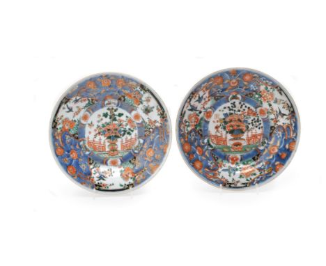 A pair of 'Augustus the Strong' verte imari plates, Qianlong (1736-1795), each with an elaborate border of chrysanthemums and