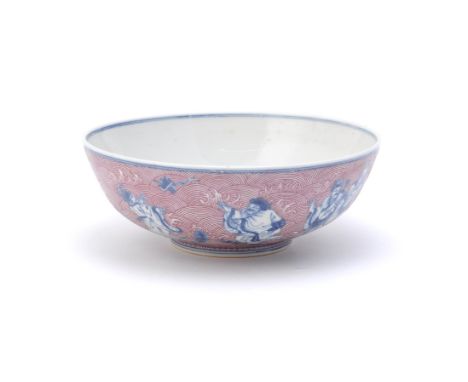 A Chinese blue and white puce enamelled bowl, Daoguang underglaze blue seal mark and possibly of the period, the wide bowl ri