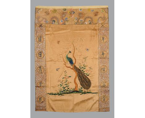 A Chinese silk embroidered 'Peacock' panel, Qing Dynasty, 19th century, with a large peacock perched in a tree and with embro