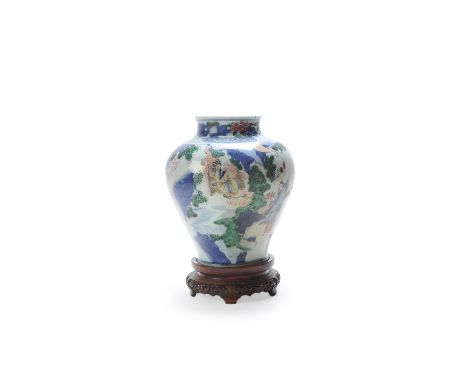 A Chinese Wucai vase, Shunzhi, circa 1650, painted in inky tones of underglaze blue, bright green, yellow, black enamels and 