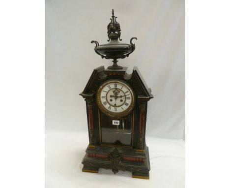 Slate and marble mantel clock with Green Man style motif and Mercury filled pendulum 