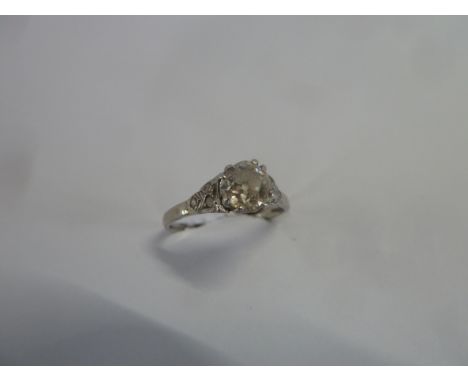 Platinum? Solitaire diamond ring (Approx 0.75ct) The shank set with six diamonds ( 2.5g )