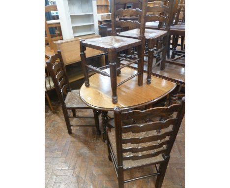 Oak barley twist gate leg table and set 4 ladder back rush seated chairs 