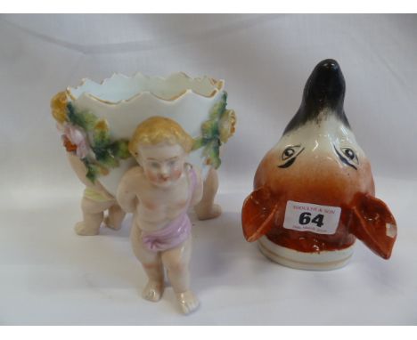 19thC Ceramic fox head stirrup cup and continental porcelain cherub and egg vase (2) 