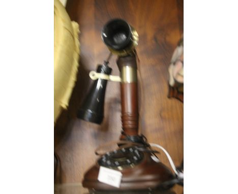 A REPRODUCTION PUSH BUTTON CANDLESTICK TELEPHONE, WIRED FOR USE ON MODERN NETWORK