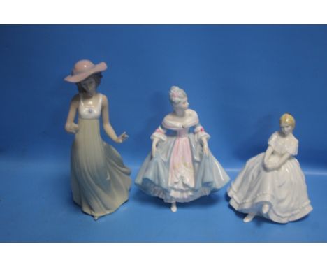 TWO ROYAL DOULTON FIGURINES - 'SOUTHERN BELLE' AND 'HEATHER' TOGETHER WITH A NAO FIGURINE A/FCondition Report:NAO FIGURINES -