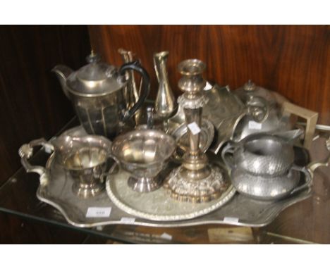 A PLATED BUTLER'S TRAY CONTAINING PEWTER AND PLATED ITEMS TO INCLUDE MILK JUG, SUGAR BOWL, TEAPOT, COFFEE POT, CANDLESTICK