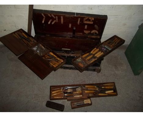 A WOODEN CARPENTER'S TOOL BOX AND CONTENTS