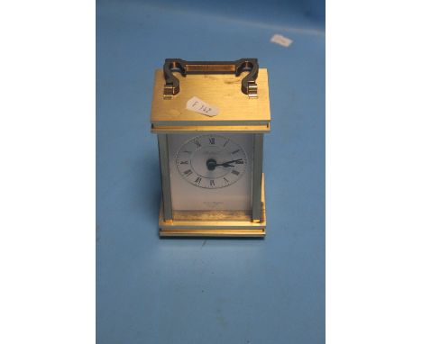 A HEAVY BRASS A. JAMES, MADE IN ENGLAND CARRIAGE CLOCK