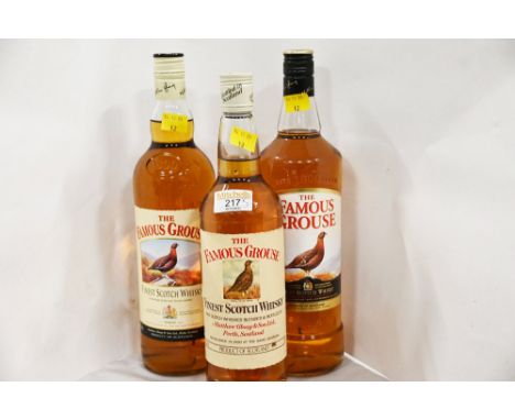 Three bottles of The Famous Grouse Scotch Whisky, 1 litre and 75 cl bottles 