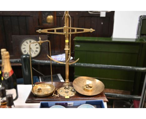 Large set of vintage brass balance scales on hardwood base by Bartlett of Bristol 