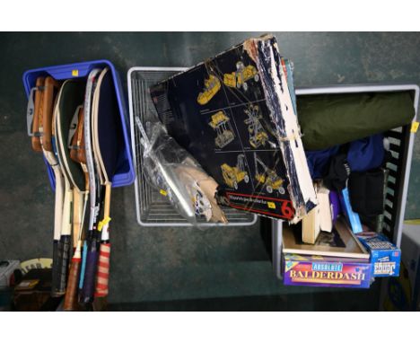 Three boxes of vintage Meccano sets, board games, tennis rackets, annuals, waterproofs etc 