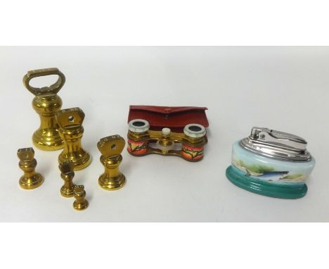 Various size brass bell weights, Minton's 'Fish' table lighter, pair of cased opera glasses