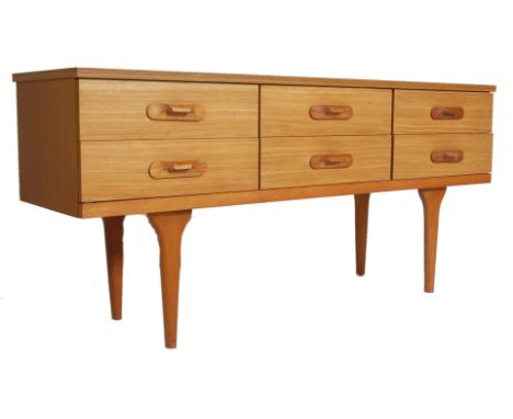 A vintage retro 20th century Austinsuite teak veneer &nbsp;six drawers chest of drawers / sideboard credenza with raised hand