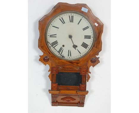 A 19th century walnut cased drop dial station clock. The white dial with roman numeral chapter ring over glass pendulum windo