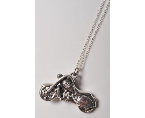 A white metal plated Harley Davidson style motorcycle pendant necklace on a stamped .925 silver chain with a lobster clasp. G