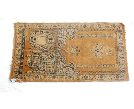 A 19th century Islamic / Middle Eastern Turkish&nbsp;Mihrab prayer rug of small proportion having brown pile direction to the