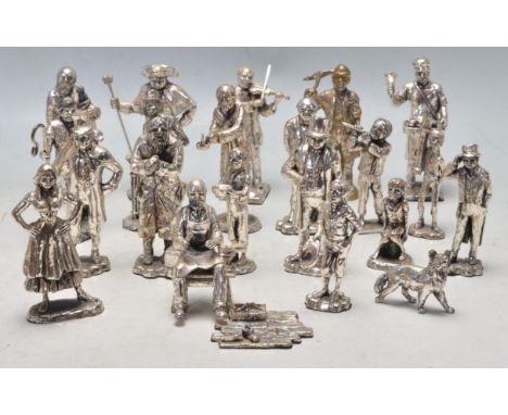 A large collection of Royal Hampshire Art Foundry silvered pewter figures to include: Nancy, Timmy Tim, Bill Sykes, Shepherd 