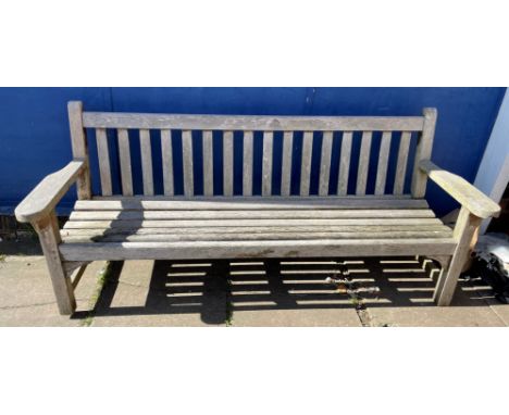 WEATHERED HARD WOOD SLATTED BENCH