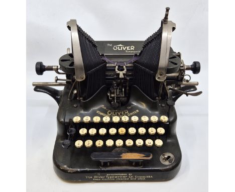 An Oliver No.5 "Standard Visible Writer" typewriter , c.1907-1914,&nbsp;with original cover, lacking base.&nbsp;
