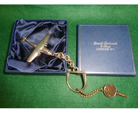 A sterling silver "aeroplane" keyring, in David Richards box, together with a sterling silver bangle, in Nigel Milne box, a w